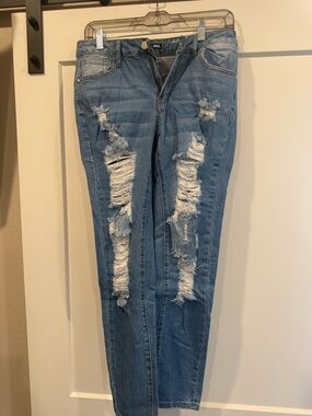 Fashion Nova Distressed Light Blue Skinny Jeans